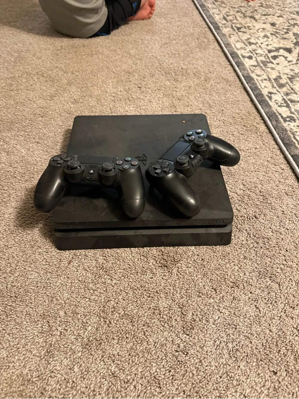 Sony Black PlayStation 4 Slim Console with Two Black DualShock Controllers